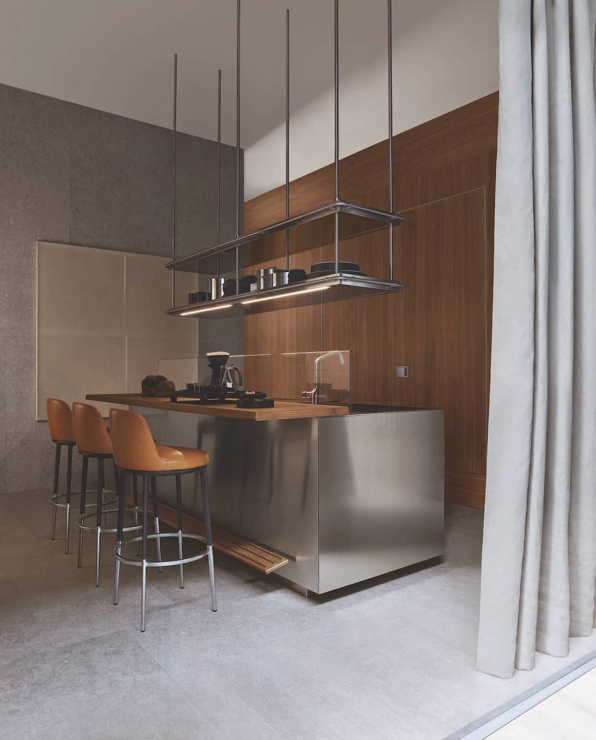 Image of an Arclinea steel kitchen with wooden snacks and tobacco-coloured designer stools